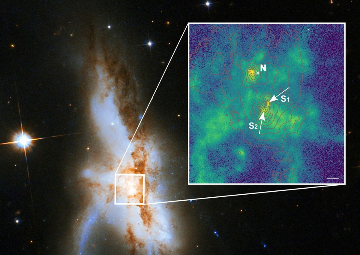 Астрономы обнаружили три сверхмассивные черные дыры в NGC 6240 Астрономы обнаружили три сверхмассивные черные дыры в NGC 6240